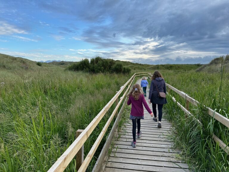 Walking in nature with her kids